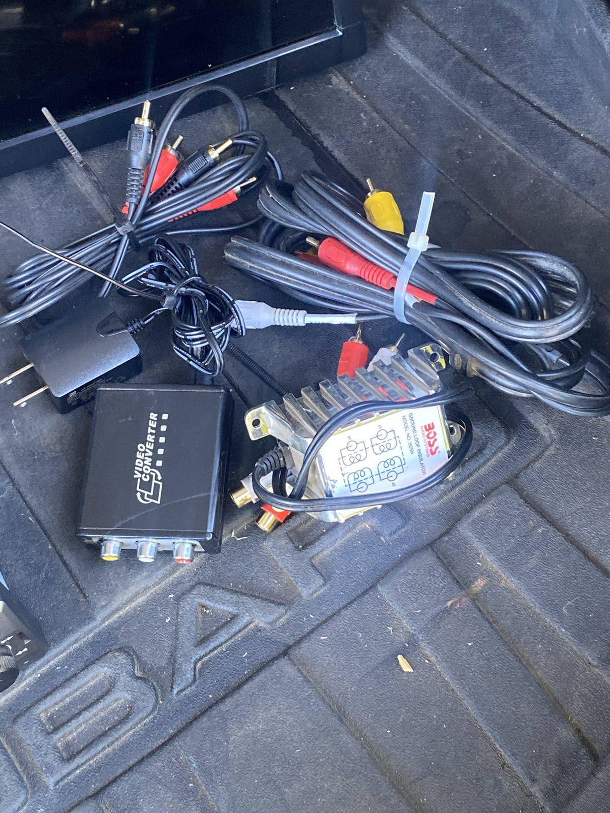 Included RCA cables, video converter and ground loop isolator